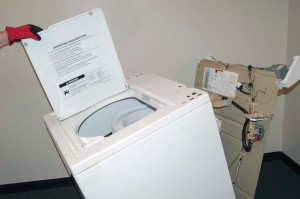 PHOTO: Remove the washer cabinet from the frame.