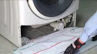 article image for Cleaning the drain pump filter on a front-load washer with no access door video