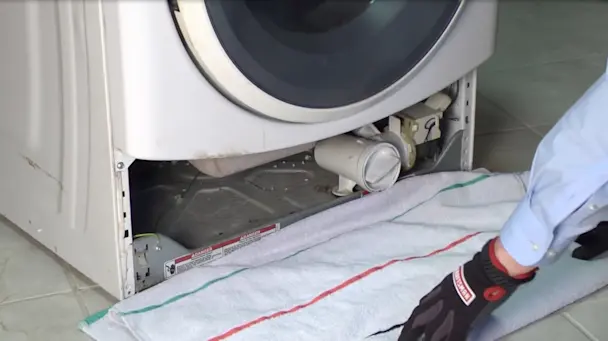 sears parts direct image for Cleaning the drain pump filter on a front-load washer with no access door video