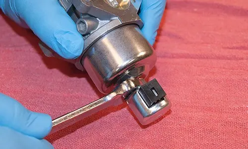 PHOTO: Remove the fuel solenoid valve.