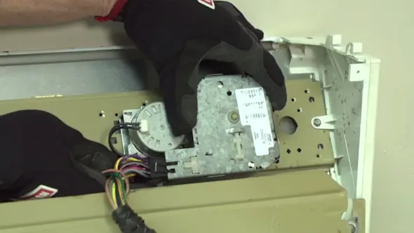 PHOTO: Plug the wire harness into the new timer.