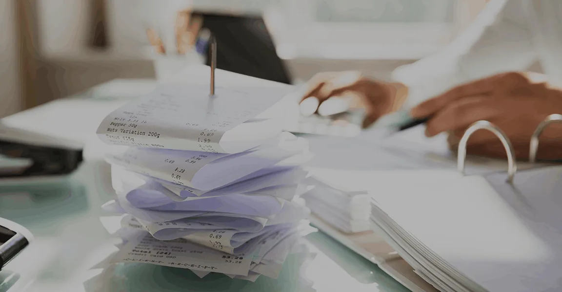 stack of paper receipts