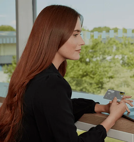 Woman holding Allstar card