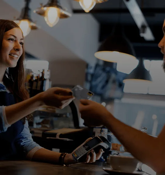 woman paying by credit card