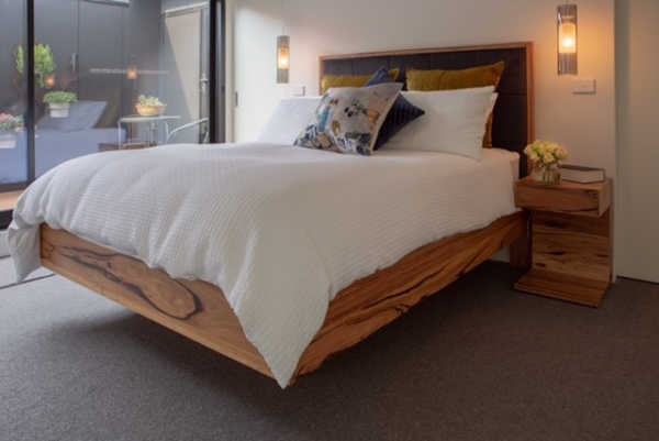 Timber bed frame in bedroom by Davis Furniture