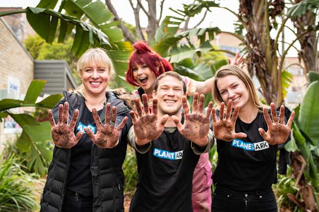 dirtgirl with Planet Ark staff at a National Tree Day event in 2019