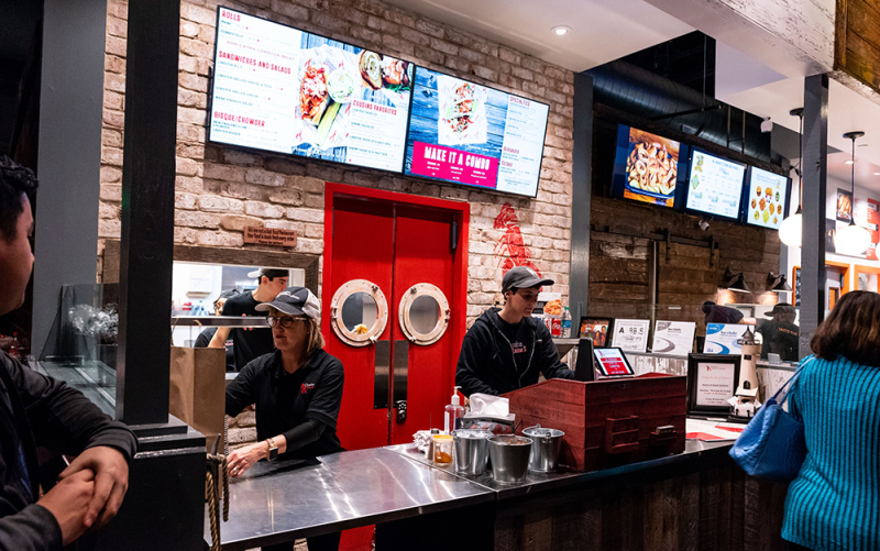 A photo of our Morgan Street Food Hall location working a lunch rush.