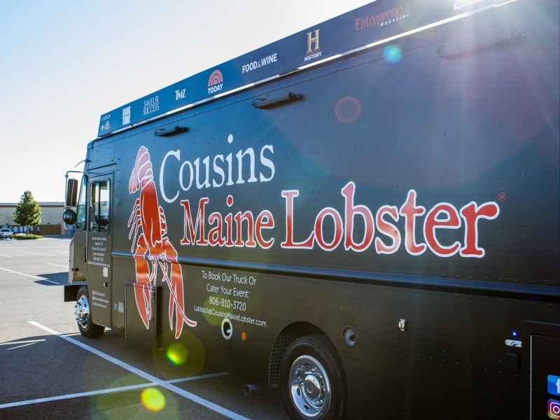 The sun beams down on the largest Cousins Maine Lobster truck at its Grand Opening in Lubbock, Tx!