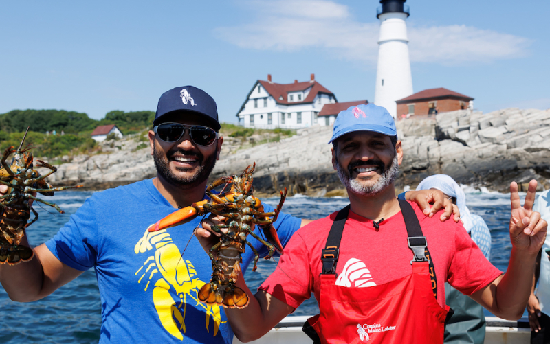An image of our SF and Denver owners on a lobster boat in Maine, holding live lobsters