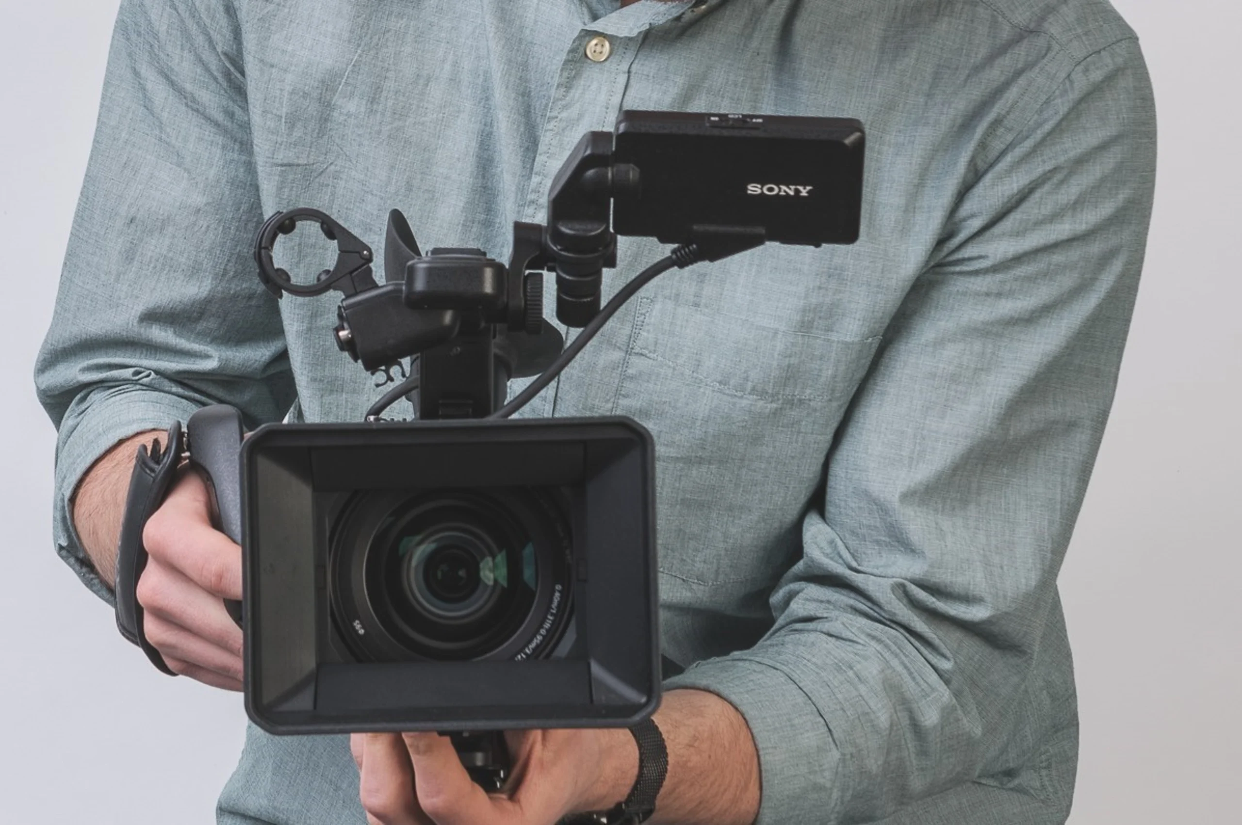 Guy holding camera