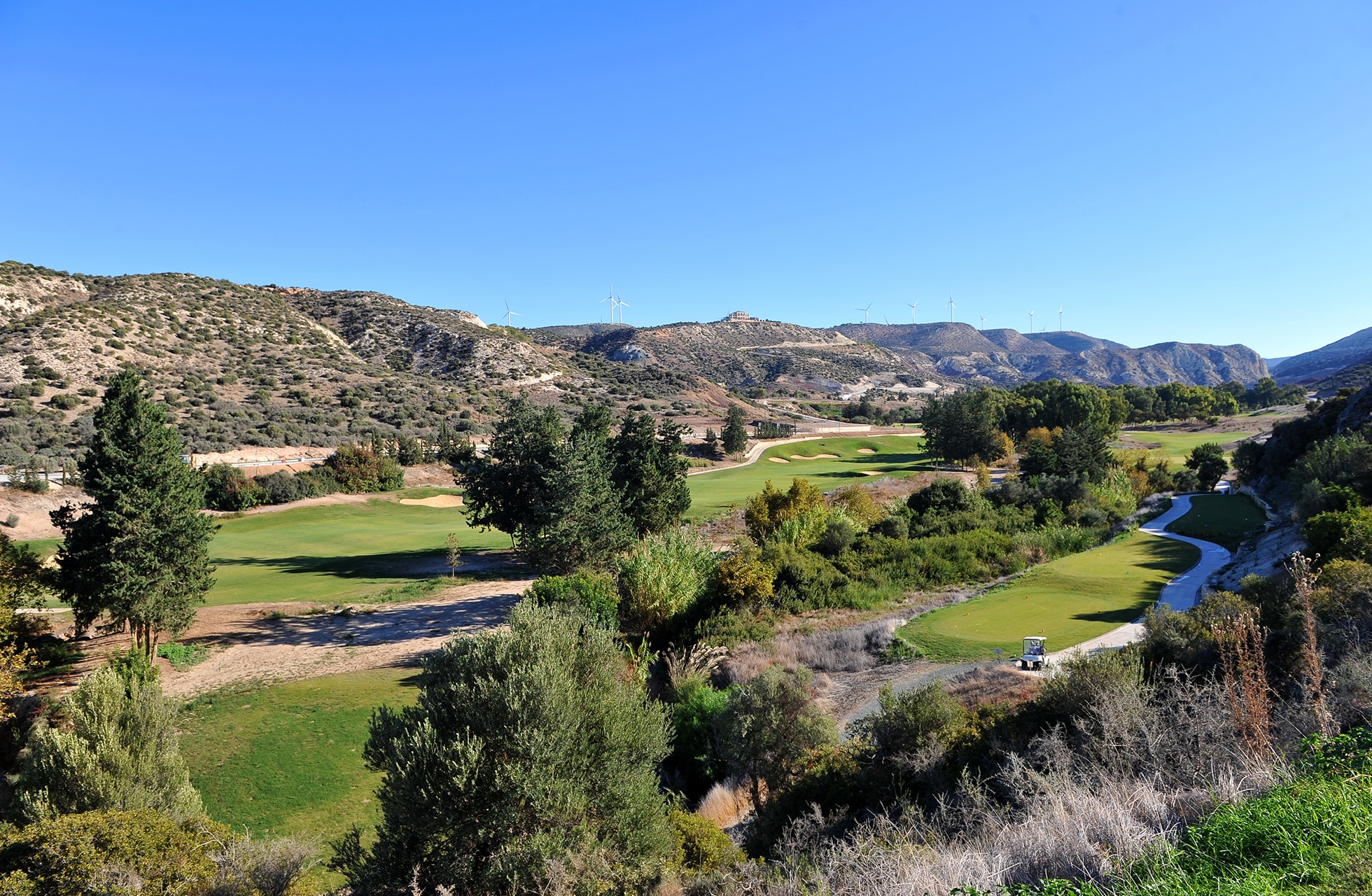 panoramautsikt over secret valley golf club med fairways og kupert terreng