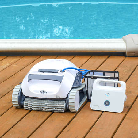 Maytronics Dolphin E 10 on the pool deck with accessories