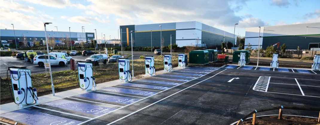A row of  bp pulse ev chargers which are all available for use.