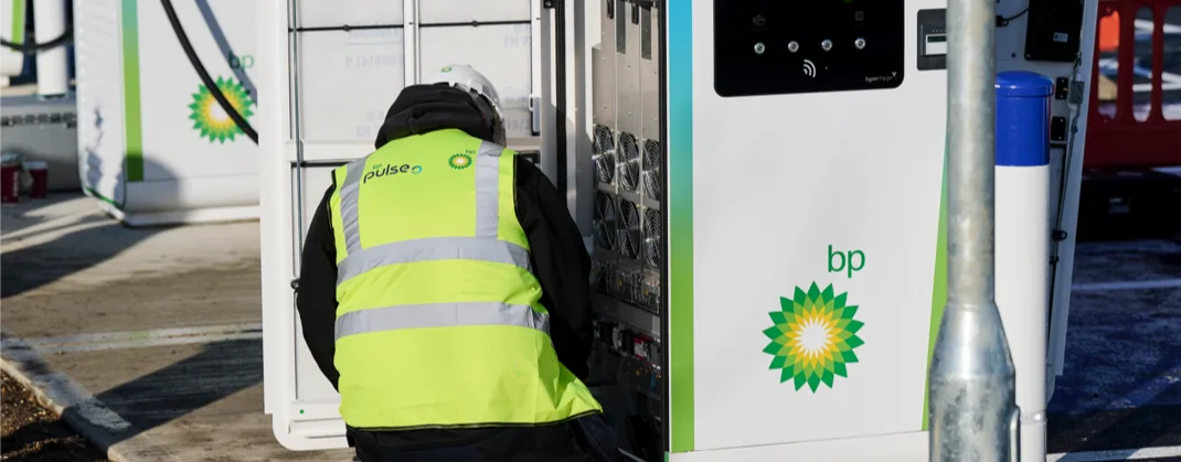 A bp pulse worker conducting maintenance work on a bp pulse charger.