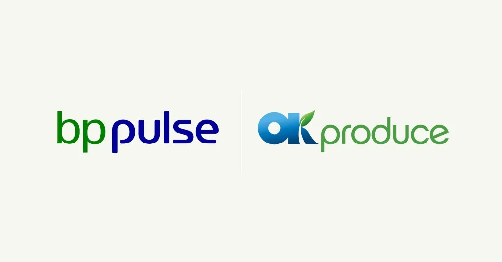 The bp pulse and OK produce logos sit alongside each other on a solid grey background.