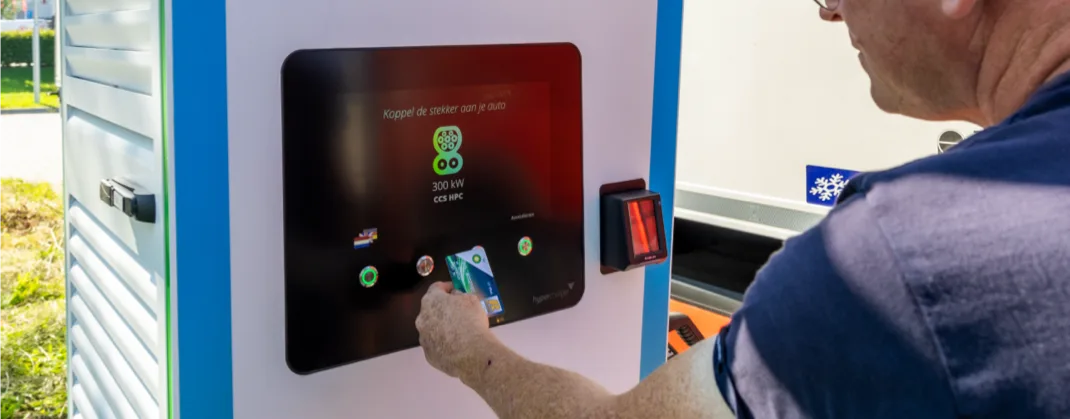 Man using his bp pulse charge card to pay for a charge session.