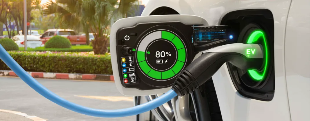 A charger plugged into an EV vehicle that is currently charged at 80 percent.