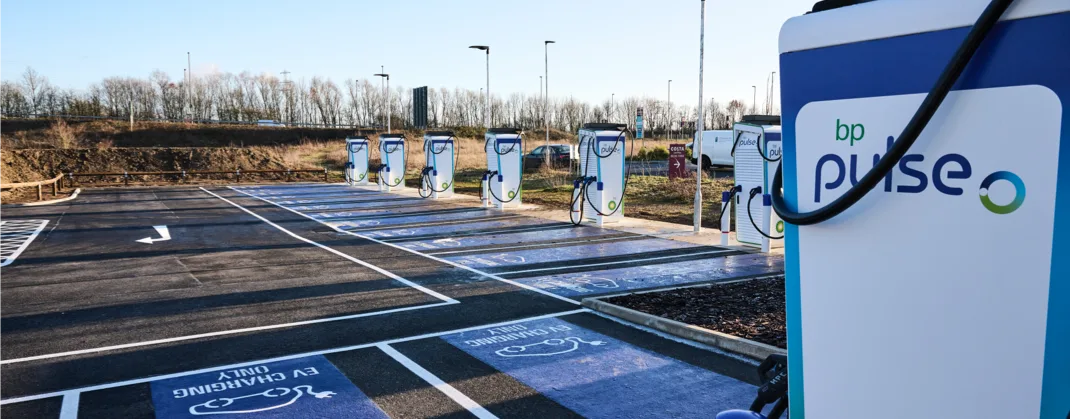 An empty row of bp pulse chargers at a charging station. 