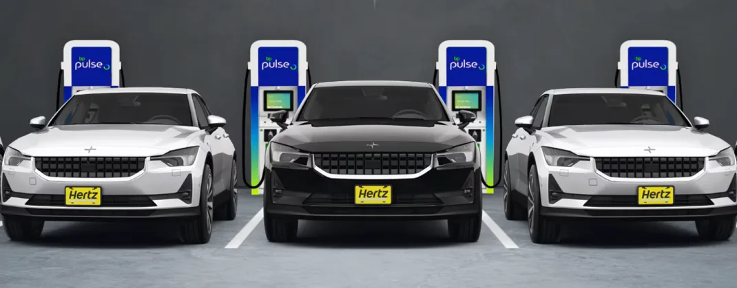 Three EVs with 'Hertz' on the registration plate, parked in front of bp pulse chargers.