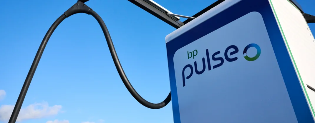 A bp pulse charger standing in the sunshine and blue sky. 