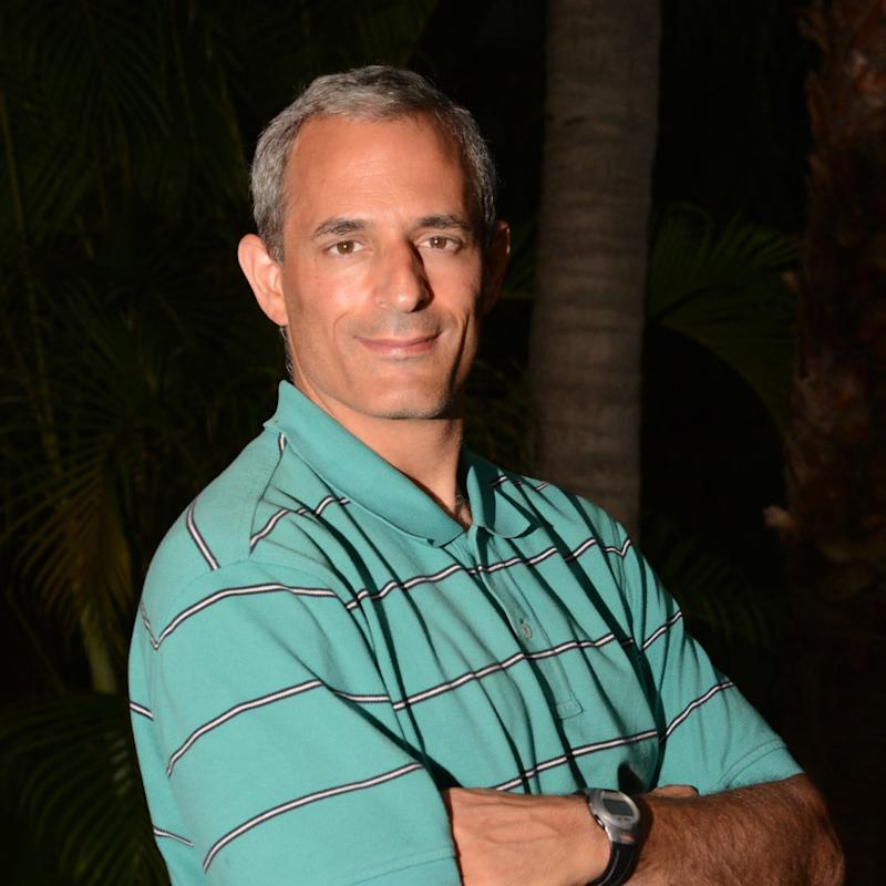 A portrait photo of our practitioner, Uzi Chen