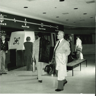Guests gather at one of the new WEDway stations in 1981. The original route connected Terminals A, B and C and the airport hotel, giving travelers a dependable ride beneath the expanding airport.