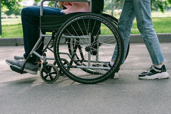 What does airport assistance for disabled travelers include?