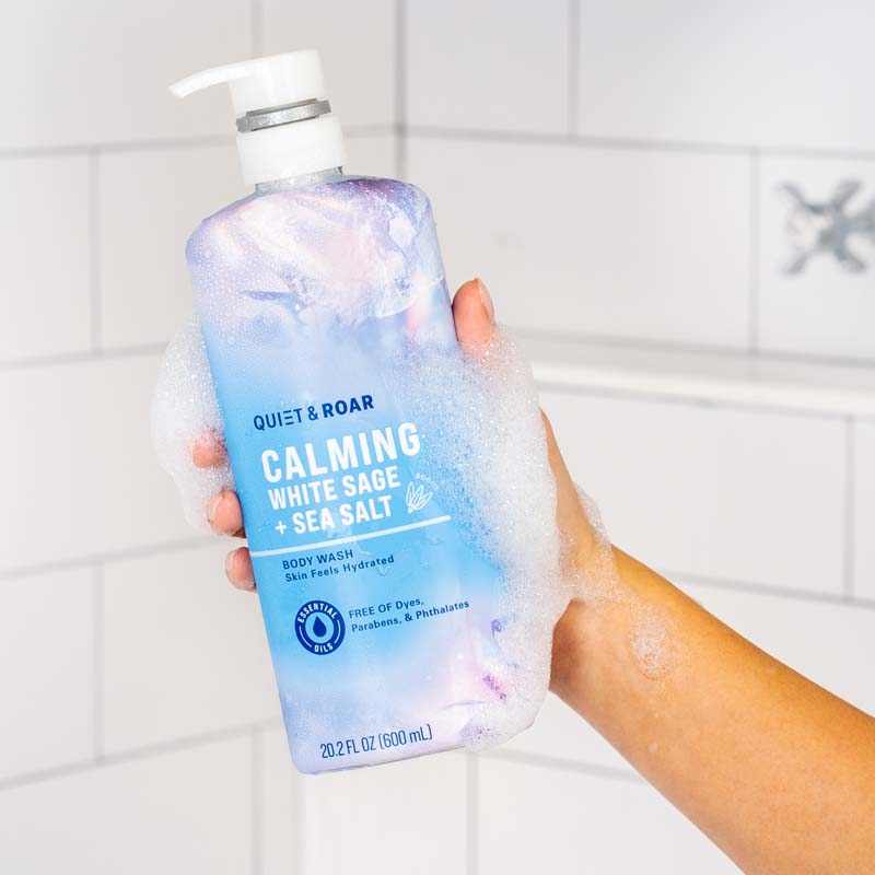 CALMING WHITE SAGE + SEA SALT BODY WASH in hand