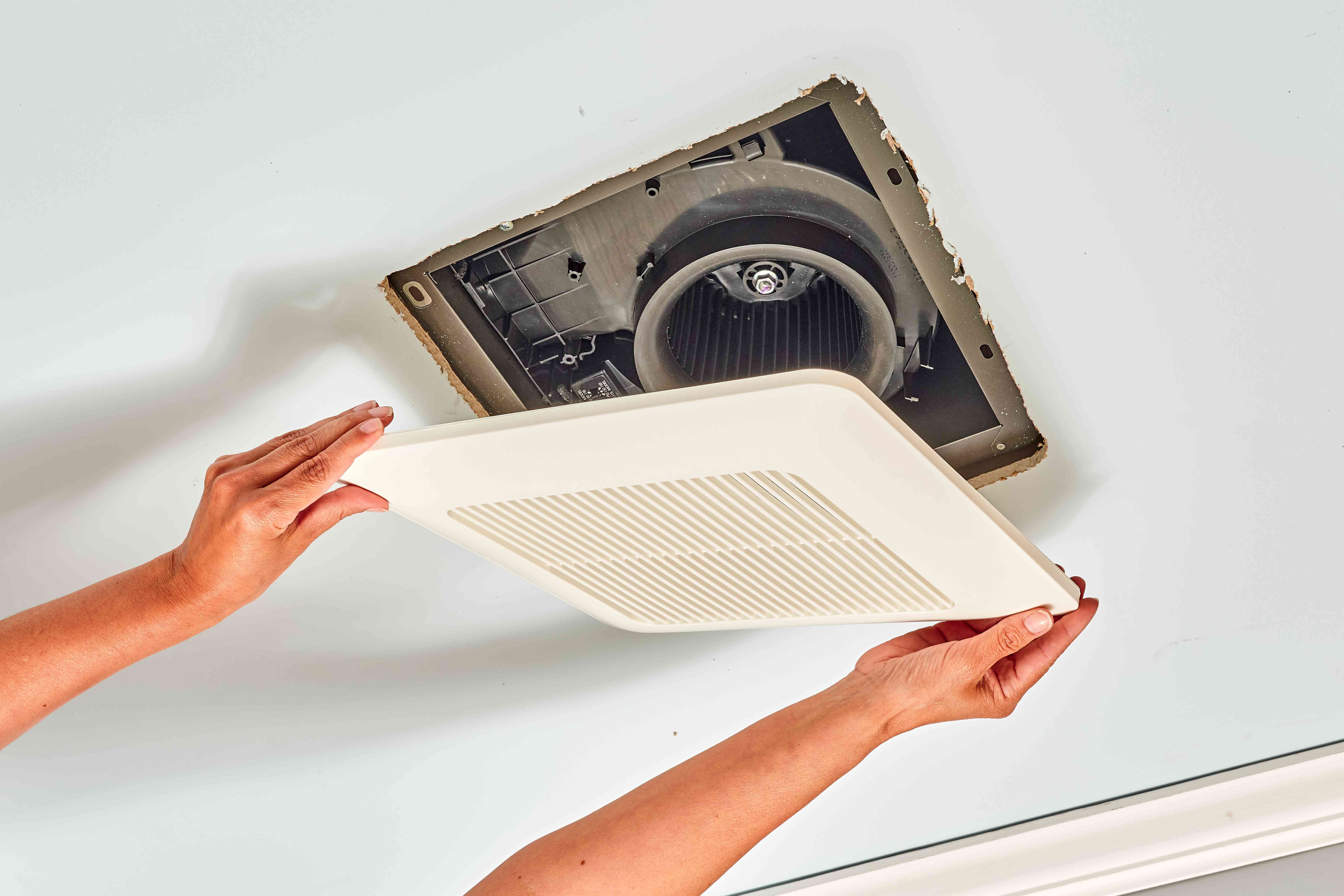 removing bathroom exhaust fan cover