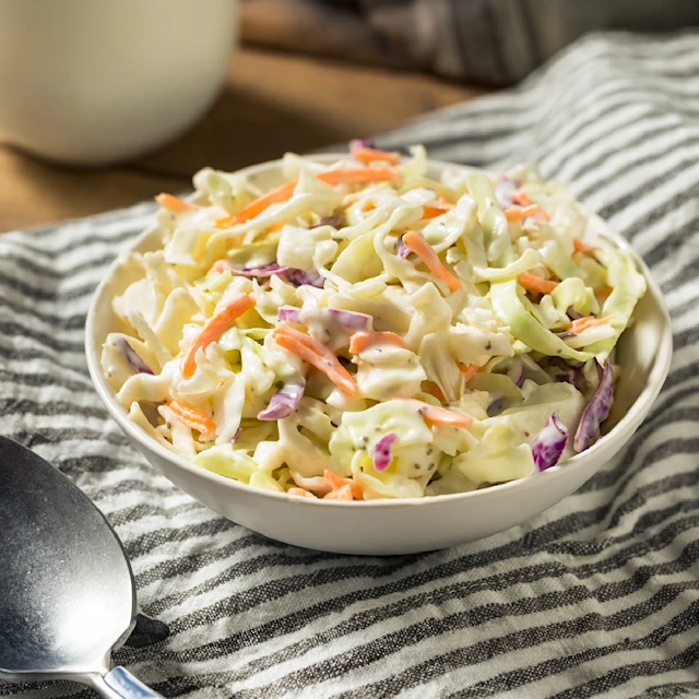 Bowl of three cabbage coleslaw