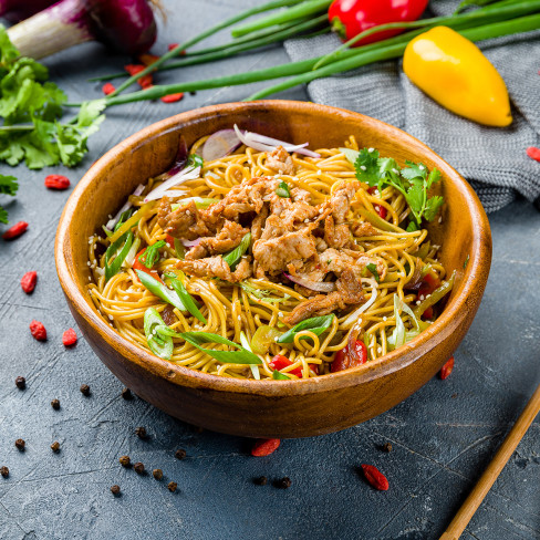 A bowl of Sesame Chicken and Noodle Stir-Fry
