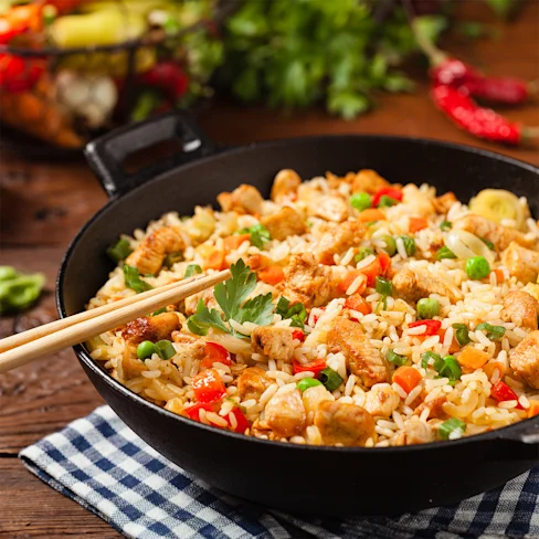 A bowl of cilantro chili & lemon chicken fried rice