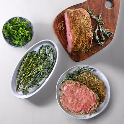plates with Dijon and Herb Crusted Striploin Roast