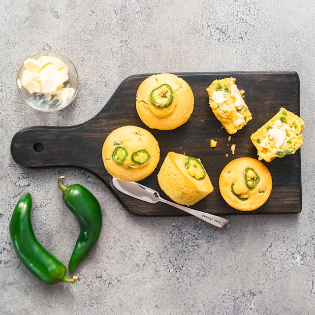 Serving board with Mini Jalapeño Cornbread and butter