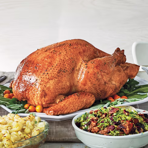 Image of a plate of roasted turkey with vegetables