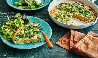 Plates of frittata with salads