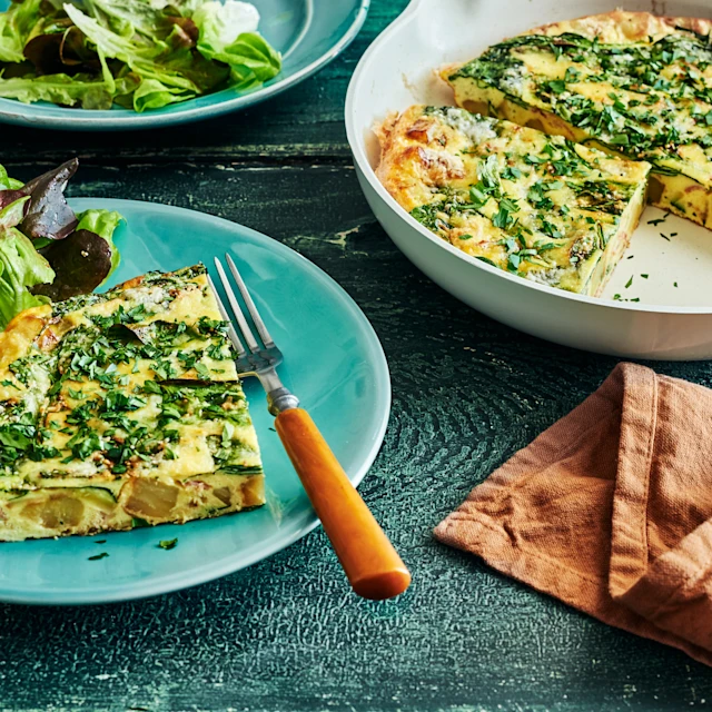 Plates of frittata with salads