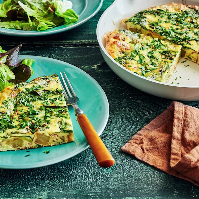 Plates of frittata with salads