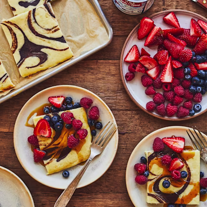 Plated marble pancakes served with fruit