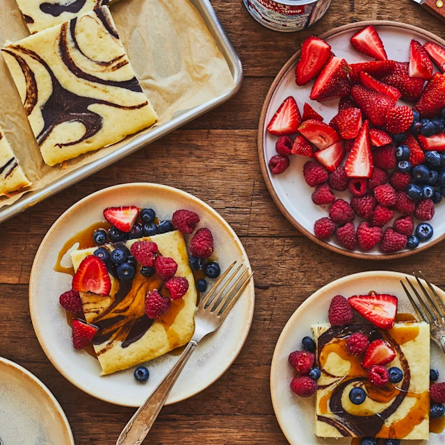Plated marble pancakes served with fruit