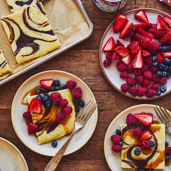 Plated marble pancakes served with fruit