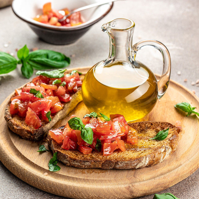 A serving board with Bruschetta Topped Flatbread