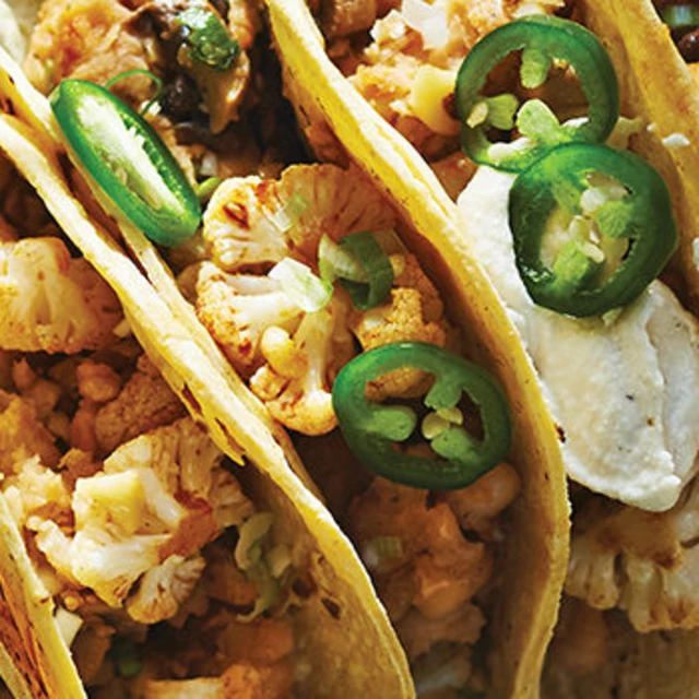 A plate of vegan white bean and mushroom tacos