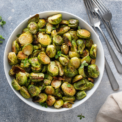 A bowl of Roasted Brussels Sprouts with Parsley, Lemon & Almonds