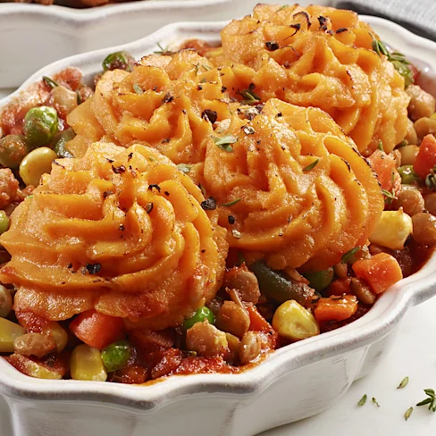 Aerial view of a plate of vegetarian sweet potato shepherd’s pie