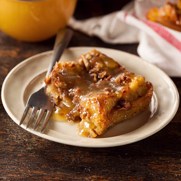 A slice of Walnut Bread Pudding with Vanilla Caramel Sauce