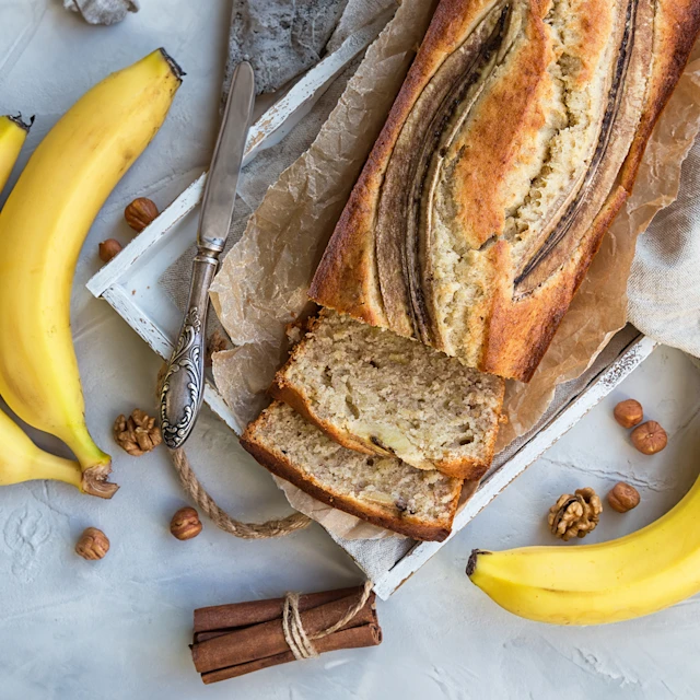 Aerial view of partially sliced banana bread