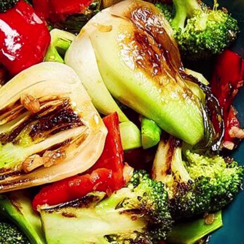 A plate of Charred Broccoli & Bok Choy with Honey-Hoisin Sauce