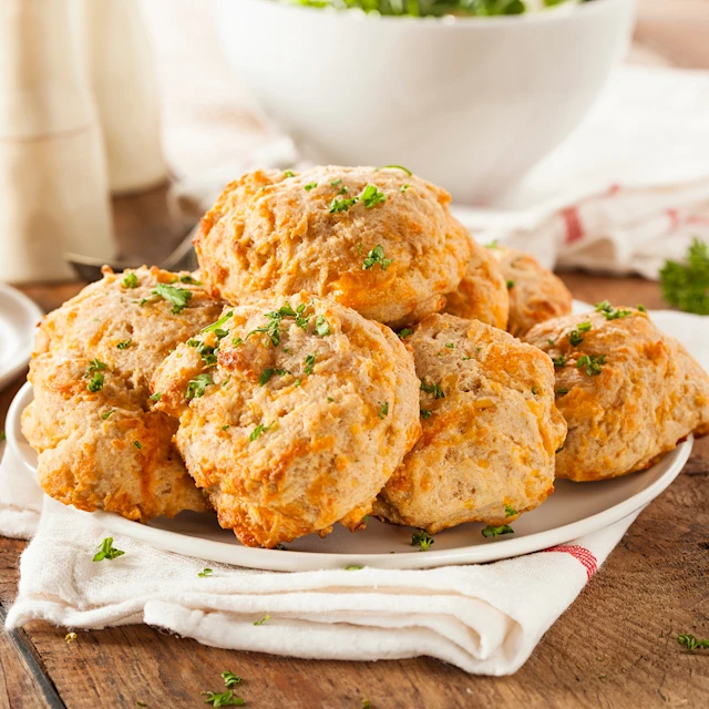 plate of oat biscuits topped with chives
