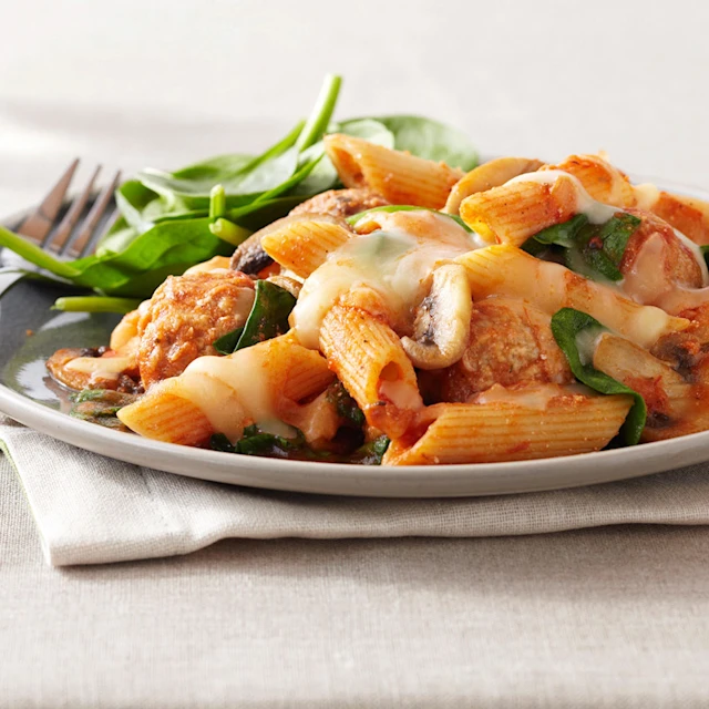 Aerial view of a plate of penne meatball bake